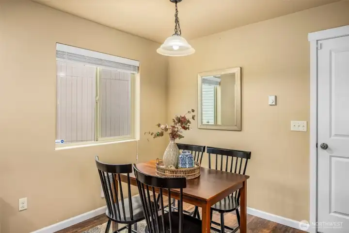 Another shot of the dining room. Door leads to garage