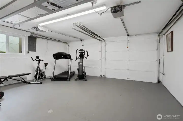 Property is wired with an electric charging station, and is also wired for a generator!  Two-car garage with bells and whistles!