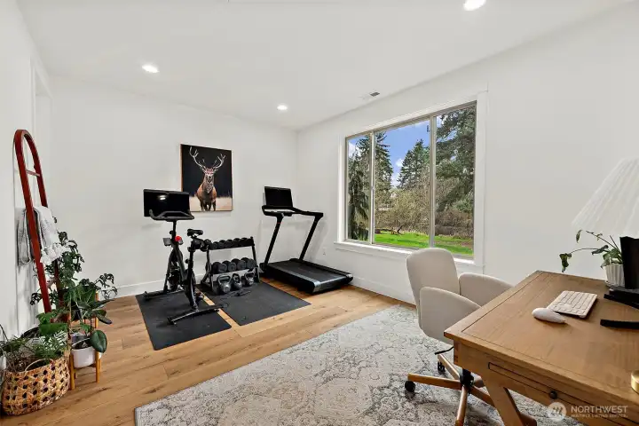 Large office has access to full bath and has walk-in closet, great view of the pond.