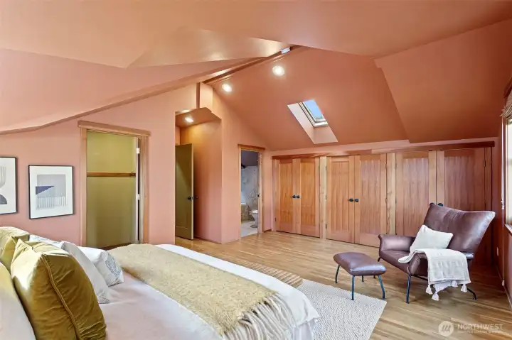 Spacious primary suite with custom closets (upper level 3)