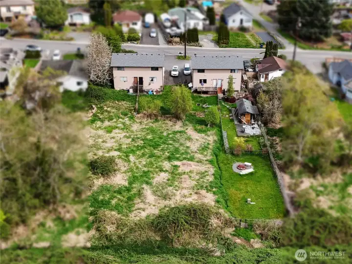 Shot of the back of the buildings and back yards