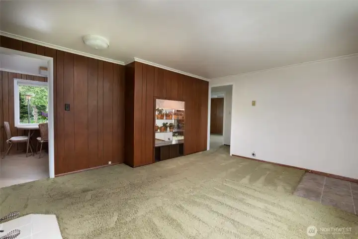 Living room enters to kitchen and bedrooms