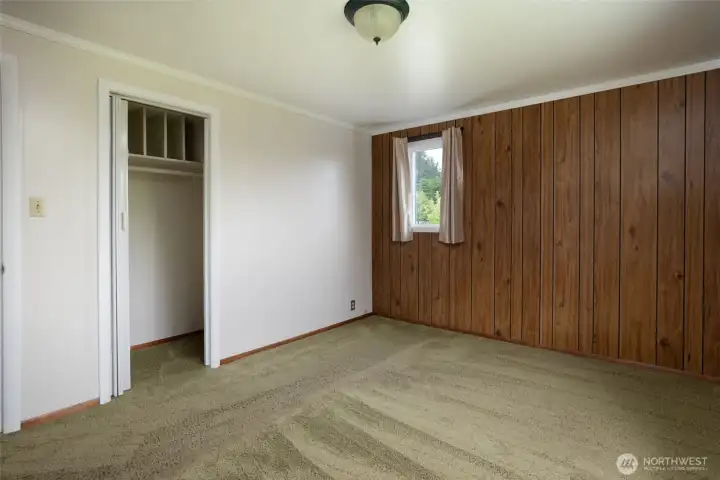 Primary bedroom overlooks the front yard
