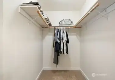 Primary Bedroom walk in closet