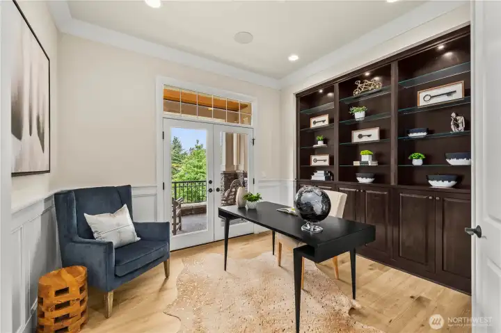 Designated office on main level with closet and built in shelves Designated office on main level with closet and built in shelves