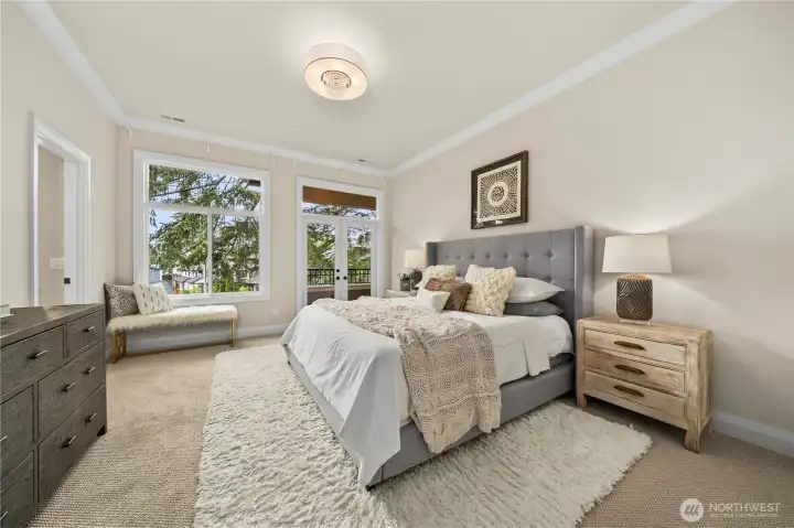 Luxurious primary suite with private patio access Luxurious primary suite with private patio access