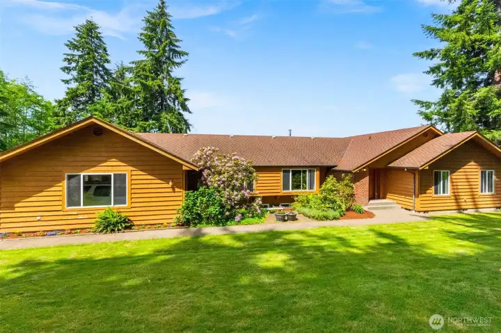 Exceptionally well maintained one-owner home on 10 acres.