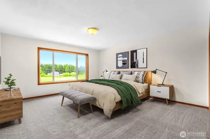 The Primary Bedroom with a few of the acreage. (virtually staged).