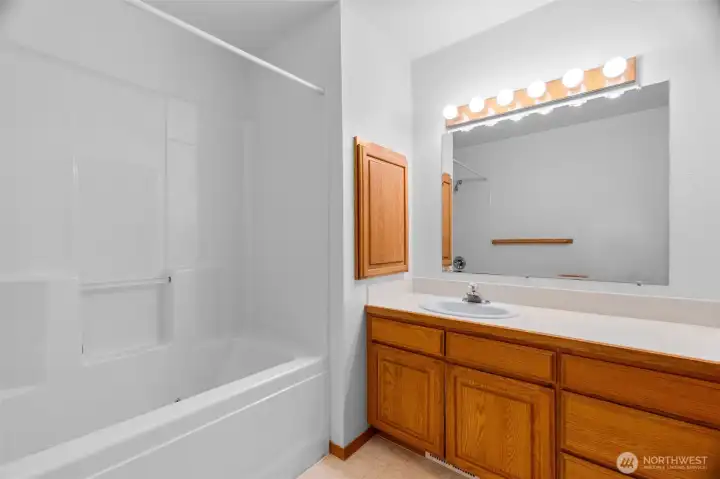 The hall bathroom with jetted tub.