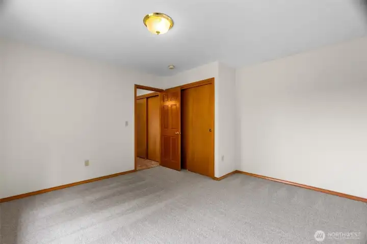 One of the many large bedrooms in the home.