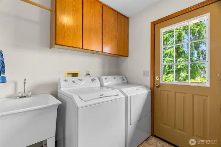 Nice large laundry mud-room with access to the back yard.