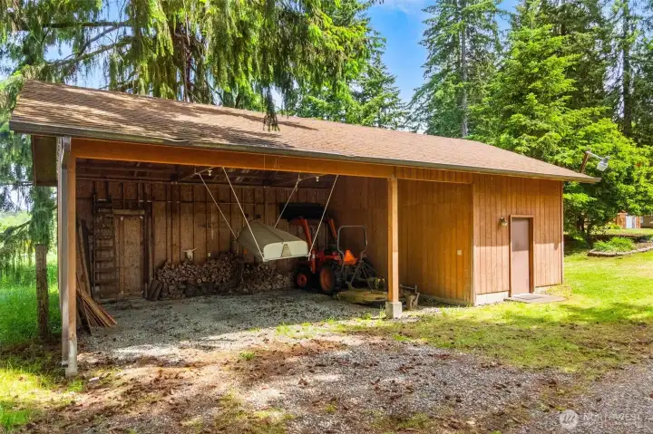 The carport with large storage area.