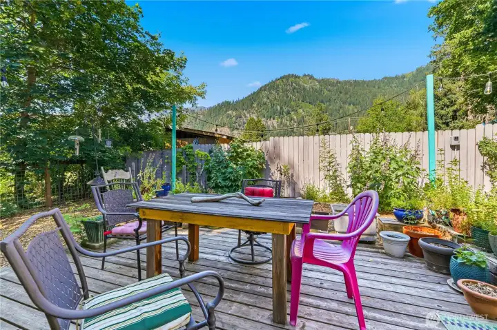 Private fenced back deck is perfect for unwinding after a long day & enjoying the Ranger Ridge views.