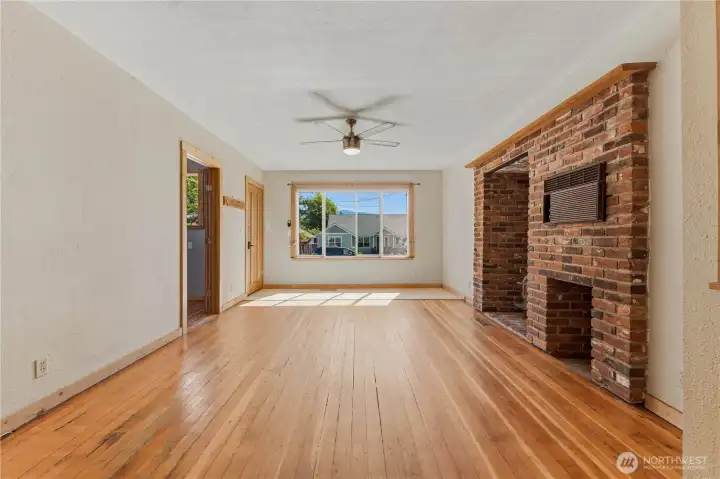 Beautiful original wood flooring in the front room.