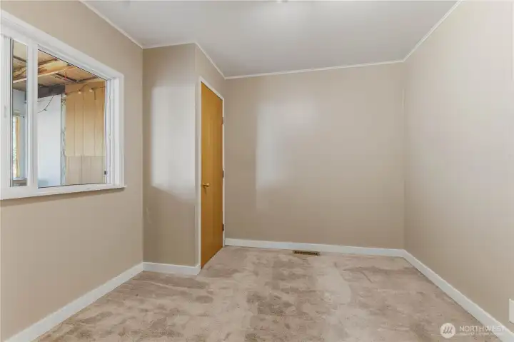 Bedroom 2 has w.all to wall carpet & white trim