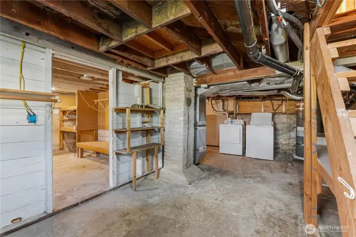 Basement has lots of storage space, with built in shelving, washer & dryer, HWT, & furnace.