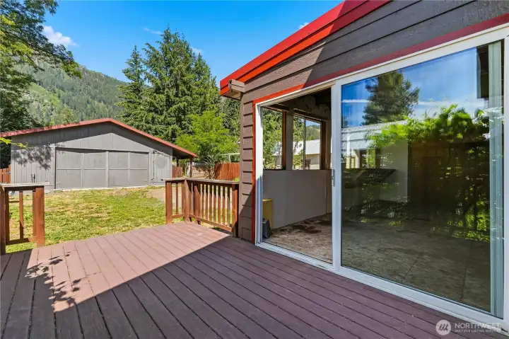Nice back deck off the sun room is a great place to dine al fresco & enjoy the sunset.