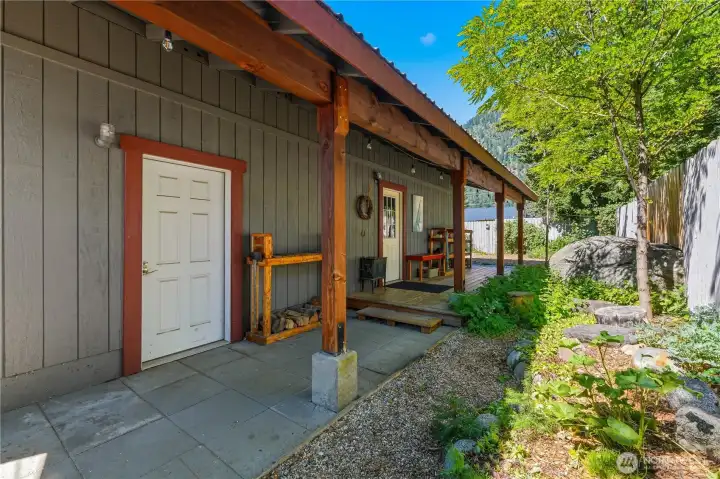 Patio entrance to garage & flex space in back of property.