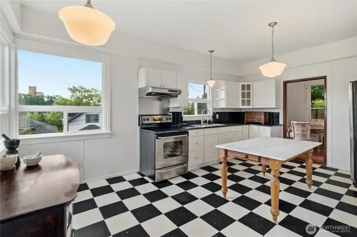 The large sunny eat-in kitchen