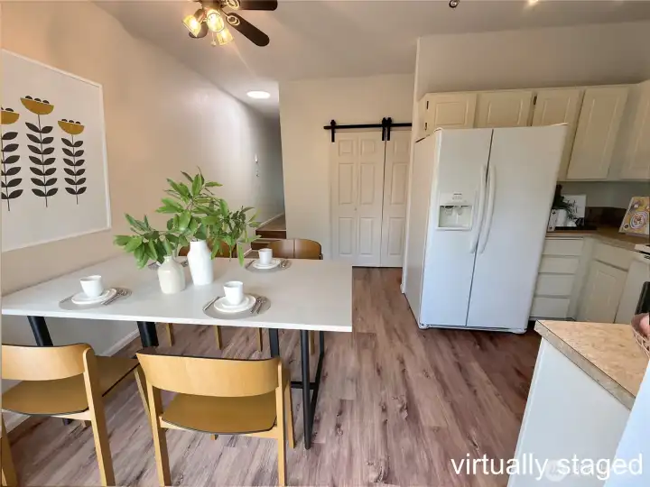 The dining room, kitchen and the barn door is the washer/dryer w/shelves The dining room, kitchen and the barn door is the washer/dryer w/shelves