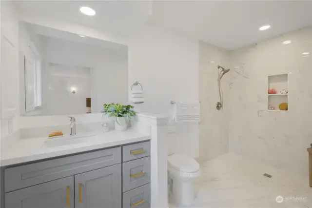 Primary bathroom with wheelchair accessible shower
