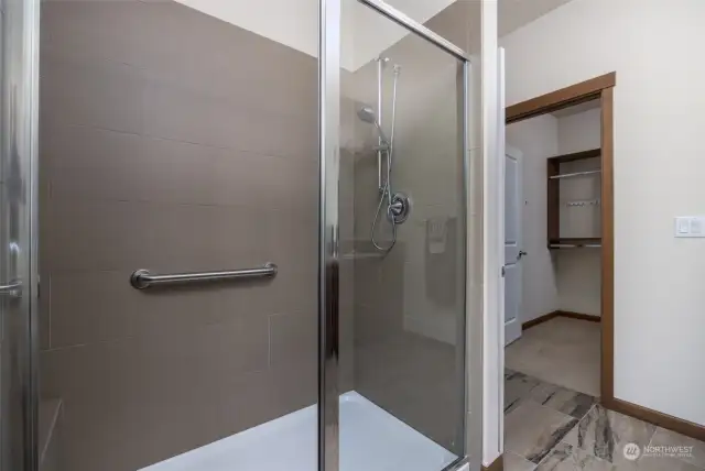Oversized primary walk-in tiled shower