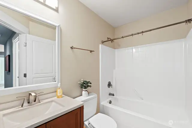 One of two full bathrooms on the upper level. Vanity and countertop installed in 2018.
