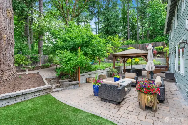 Sip your morning coffee or favorite cocktail in this relaxing, serene back yard!