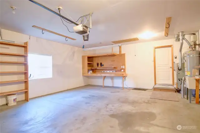 Garage with shelves and built-in work bench