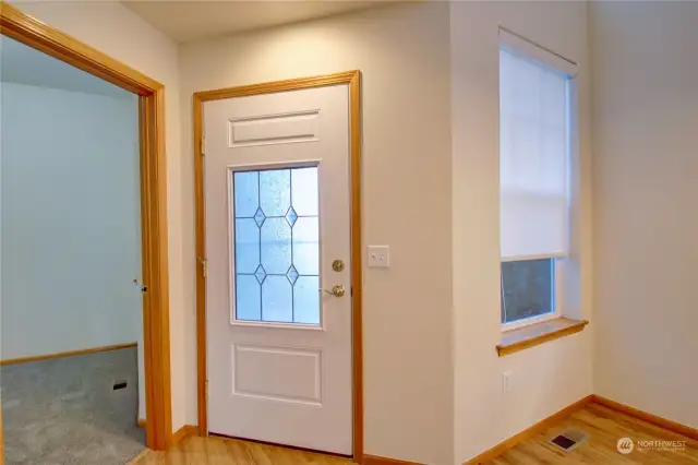 Front entry door and view into office/den