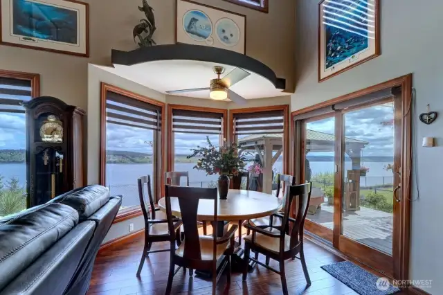 Family dining area off Chef's kitchen opens out to Trex deck with dual gazebos.