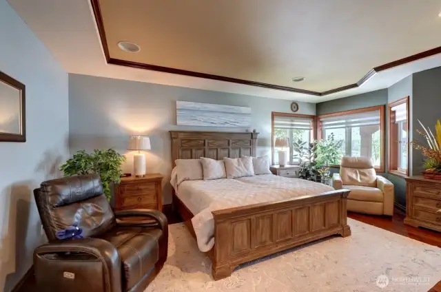Primary ensuite continues offering inviting water views.