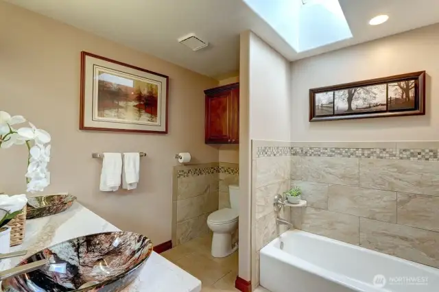 The upstairs guest bath is very comfortable.