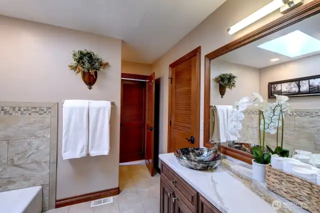 Upstairs bathroom boasts both a tub & shower.
