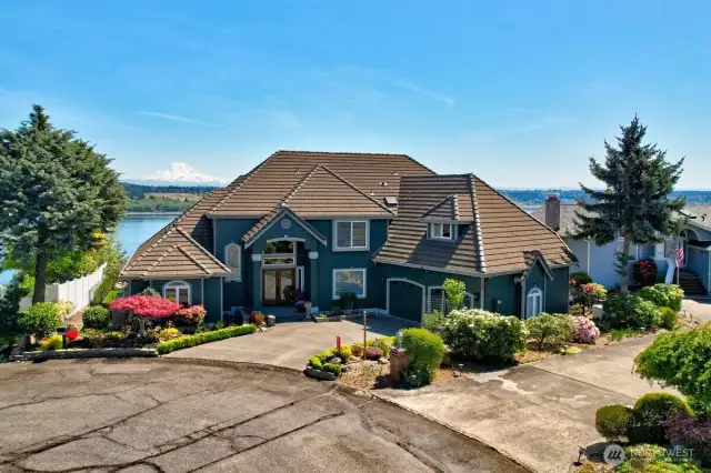 Immaculate, updated Fox Island High Bank property with magnificent water and mountain views.  You will love this home.
