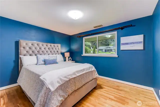 Primary bedroom with hardwoods on the main floor.