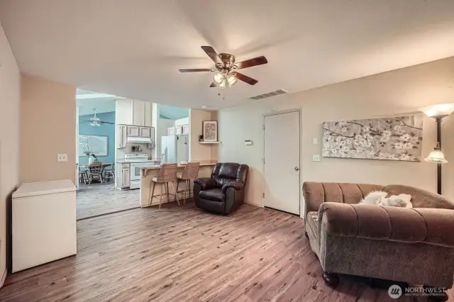 Versatile Flex Space  Just off the kitchen, this adaptable room can serve as a cozy family room, an additional dining area, or a flexible space tailored to your lifestyle needs. The perfect spot to make your own.