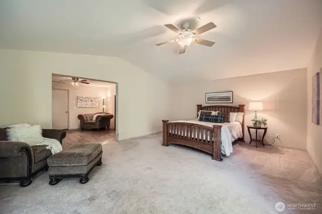 Spacious Main Floor Room  This generous main floor space, currently used as a bedroom, offers flexible potential as a bonus room, family room, or whatever suits your lifestyle best.