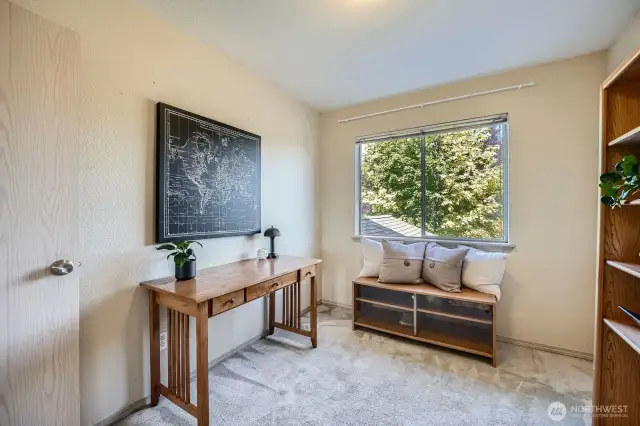 Versatile Guest Bedroom or Office  This bright and inviting room features a spacious closet and can easily function as a comfortable guest bedroom or a productive home office—perfectly adaptable to your needs.