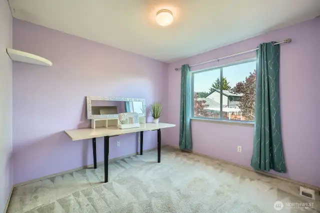 Generously Sized Second Bedroom  This spacious bedroom offers plenty of room for rest, study, or play—ideal for guests or a flexible living space that grows with your needs.