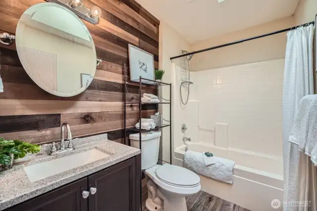 Updated Guest Bathroom  This thoughtfully updated guest bathroom combines modern finishes with practical design, providing a fresh and inviting space for family and visitors alike.
