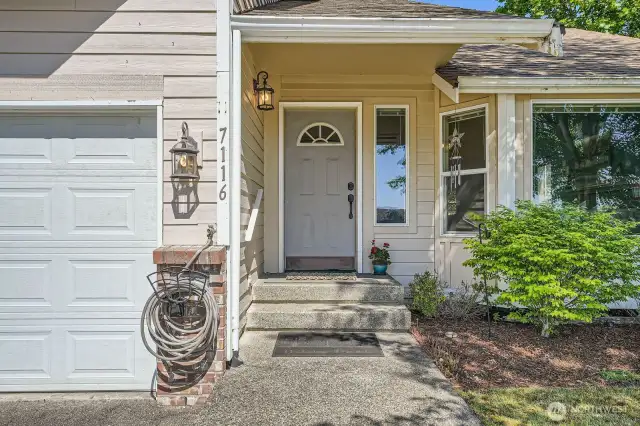 Inviting Entry  Step up to a welcoming front entry that sets the tone for the charm and comfort found throughout the home. The perfect place to greet guests and feel right at home.