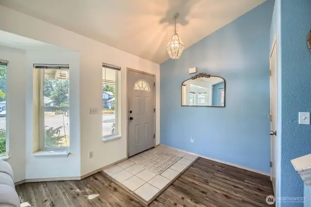 Warm & Welcoming Interior  As you step inside, you're greeted by a light-filled entryway that instantly feels like home. With a comfortable flow and thoughtful touches, this space sets the stage for the inviting interiors ahead.