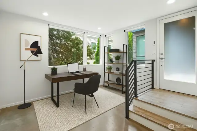 Front Entry directly onto the concrete floors of your Flex Room off the 3rd bedroom and full bathroom!