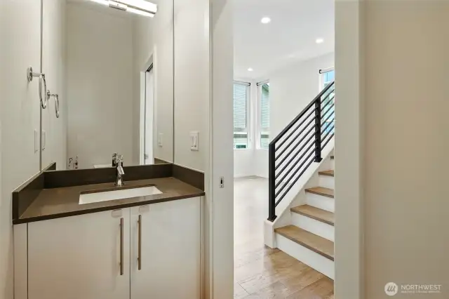 Half Bath off the Living, Kitchen and Dining rooms
