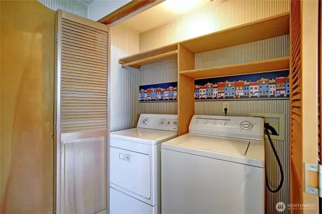 Laundry located just inside the garage door