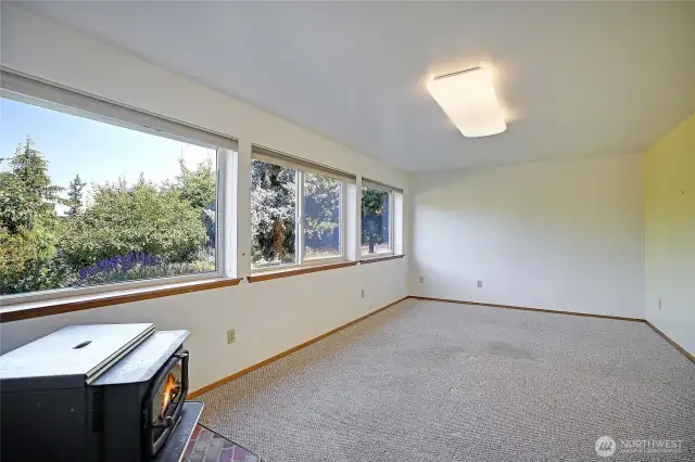 bonus room with wood stove downstairs