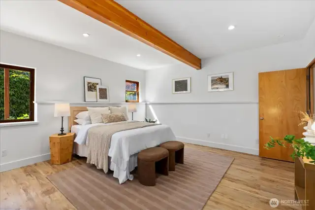 Lower level great room OR can be used as a separate living are for family or renters. Door in photo separates the upper level from lower level.