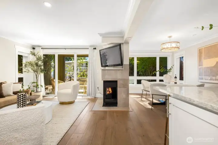 Cozy up by the tiled fireplace or step out through sliding glass doors to your private patio.