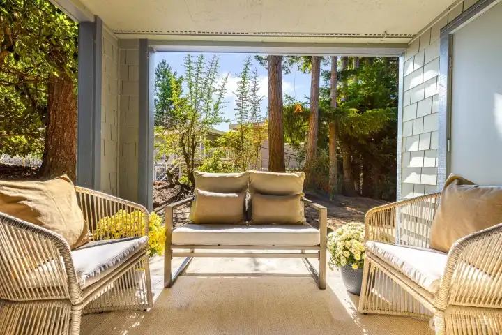 Step out to your private, covered patio—ideal for morning coffee, evening unwinding, or entertaining friends while enjoying the surrounding greenery.